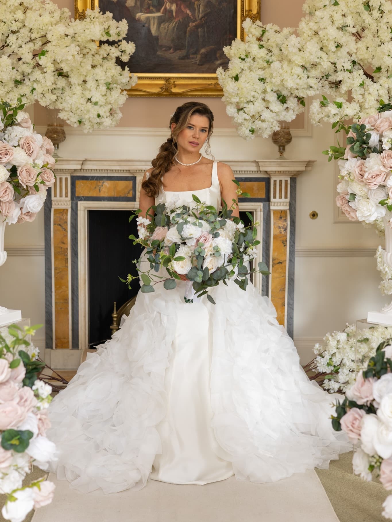 Bride with swept-back curls styled by Rach
